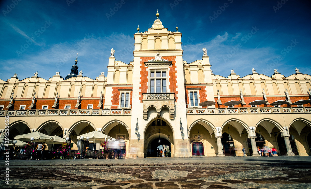 view of sunshine architecture of ancient market building in Krakow