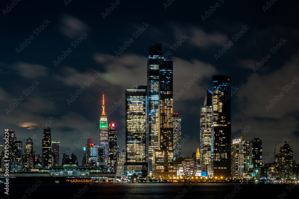 Sunset at Hudson Yards skyline of midtown Manhattan view from Hudson River