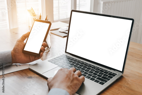 Mockup image of close up business woman working with smartphone laptop and documents in office, mockup concept