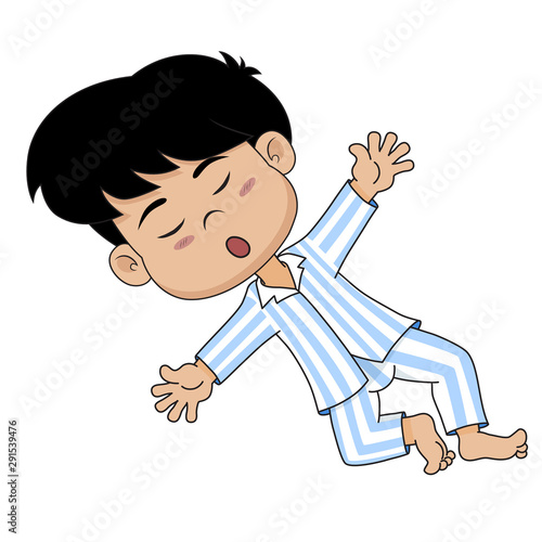 A little boy sleeping on a soft bed.He has a good night and sweet dreams.