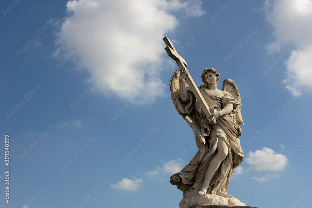 Sculpture of Angel with a Cross, Ponte Sant'Angelo - Rome, Italy Sculpture of Angel with a Cross, Ponte Sant'Angelo - Rome, Italy