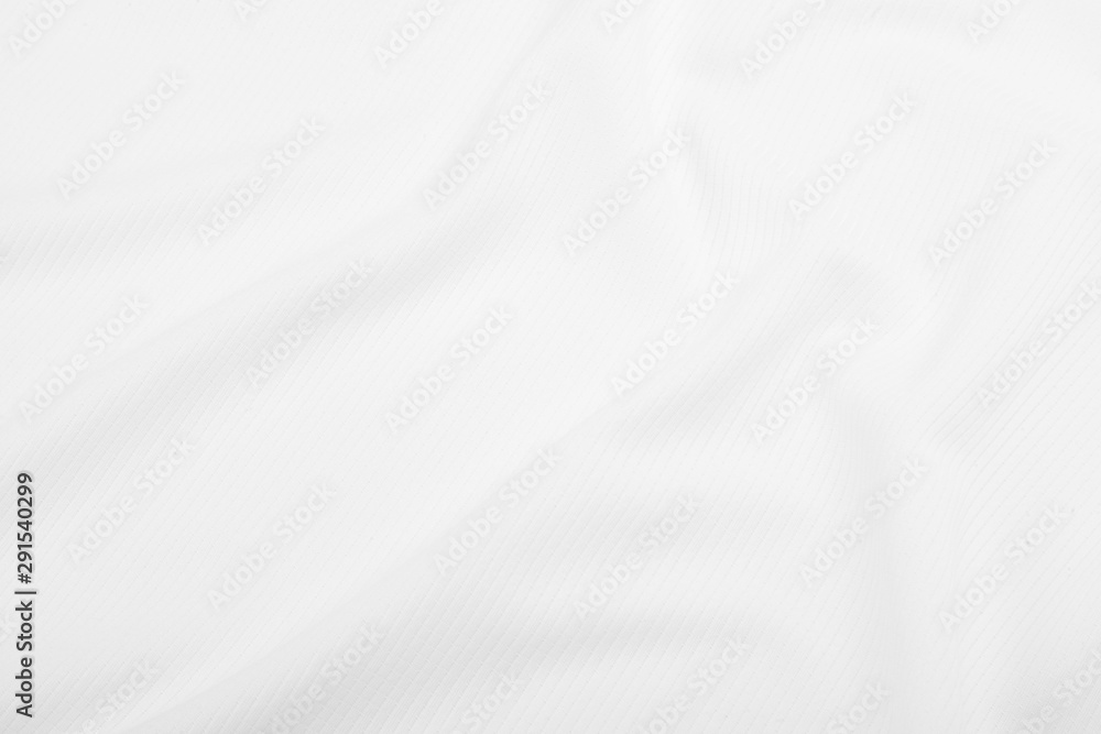 White fabric texture background with soft waves.