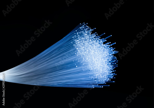 fiber optics network cable for ultra fast internet communications, thin light threads that move information at high speed.