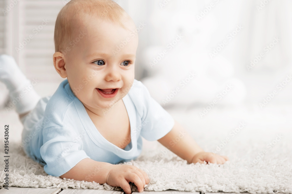Fototapeta premium Portrait of a crawling baby