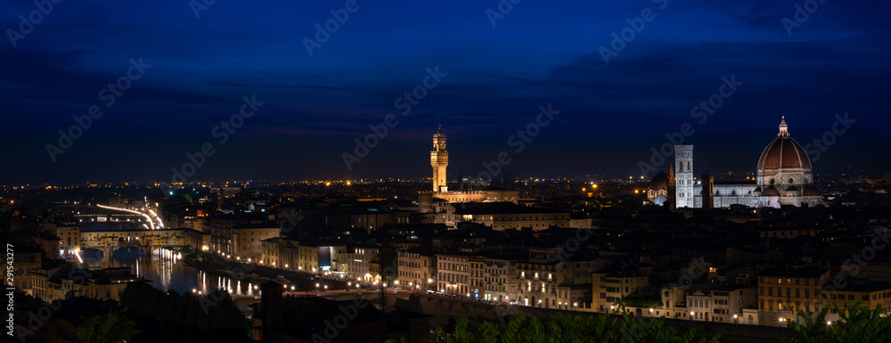 Florence by night - high resolution panorama of Florence, Tuscany, Italy at dusk with the city center and landmarks: Lungarno, cathedral and Palazzo Vecchio (medieval city hall). Over 10k pixel wide