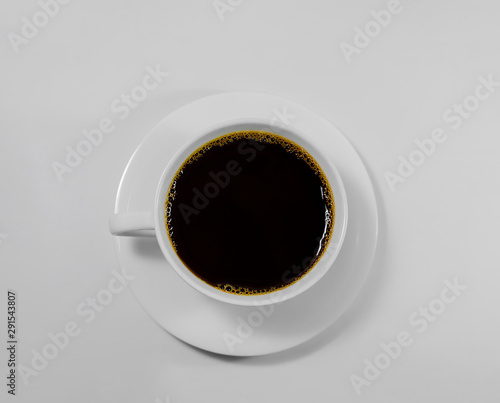 Black coffee in a white coffee cup on top view isolated on white background. Not clipping path