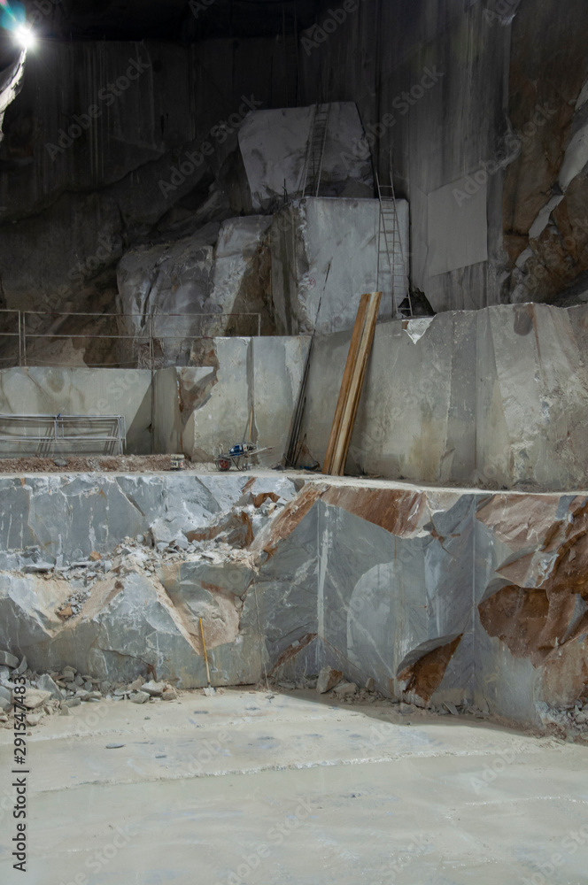Large blocks of marble inside a quarry in Carrara