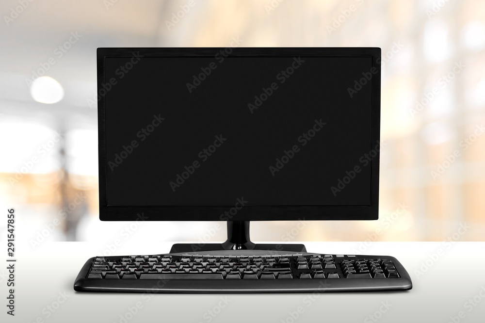 Desktop computer and keyboard on background Desktop computer and keyboard on background
