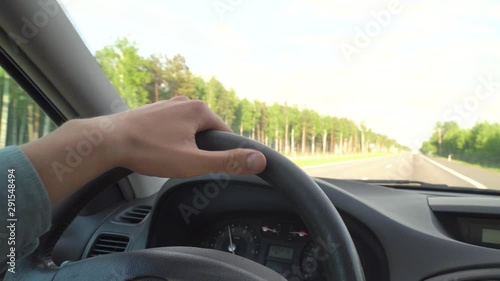 Wallpaper Mural close - up man's hand holding steering wheel car Torontodigital.ca