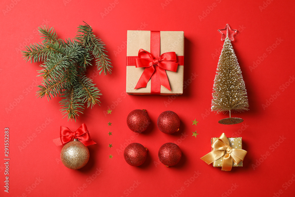 Flat lay with Christmas accessories on red background, space for text Flat lay with Christmas accessories on red background, space for text