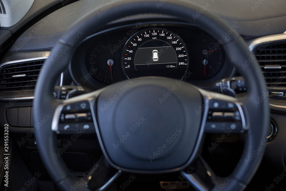 Dashboard and steering wheel of new modern car.