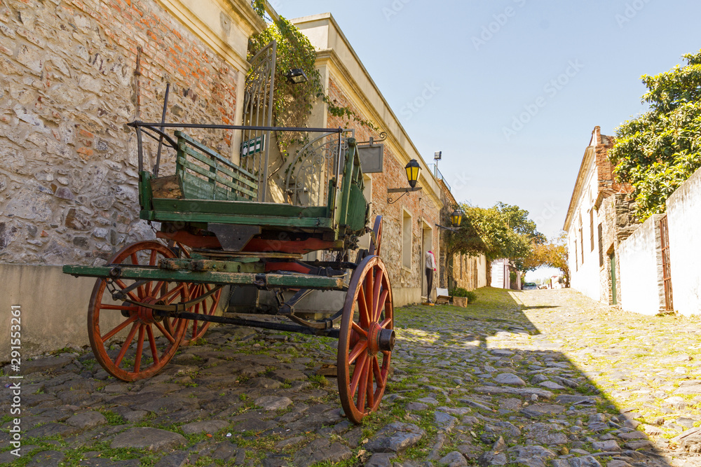 Horse carriage in the Street of Sighs, in the historic center, a World Heritage Site by Unesco in 1995. The houses are from the 18th century. Uruguayan city of Colonia del Sacramento