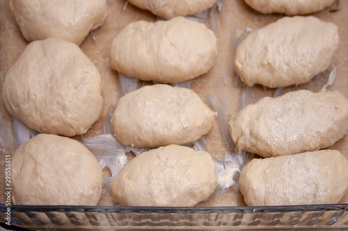 ready to cook food made from dough in glass tray