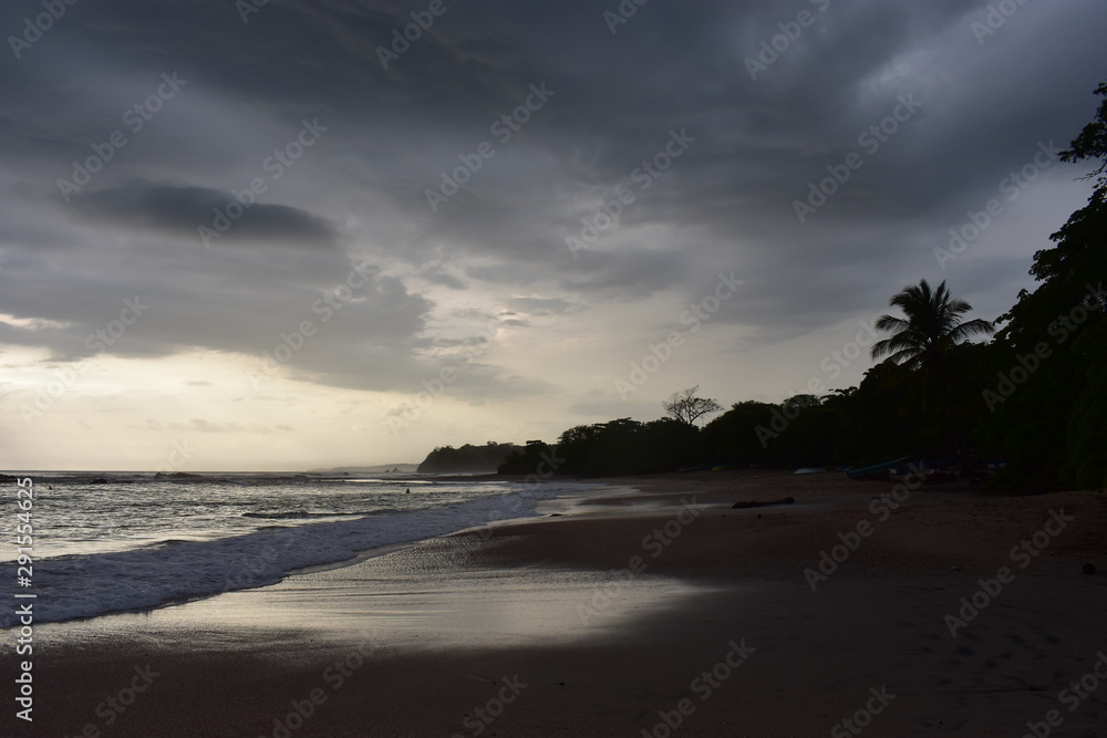 Sunset with storm on the beach of Costa Rica.