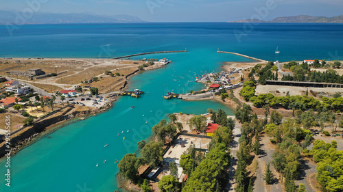 Aerial bird's eye view photo taken by drone of stand up paddle surfers in annual SUP crossing competition in Corinth Canal, Greece