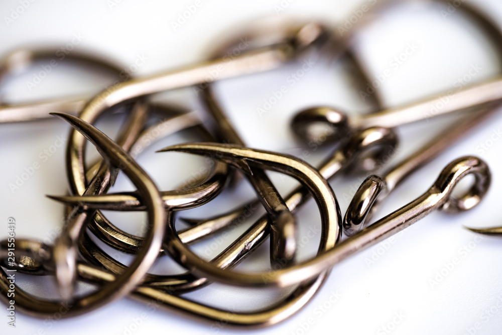 Fishing hooks on a white background Fishing hooks on a white background