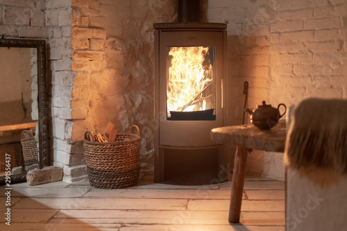 Wood stove fireplace in comfort cozy house photo