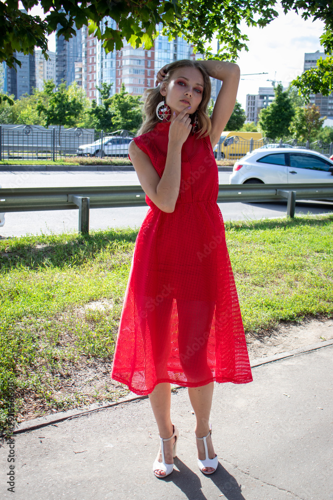 young woman in red dress