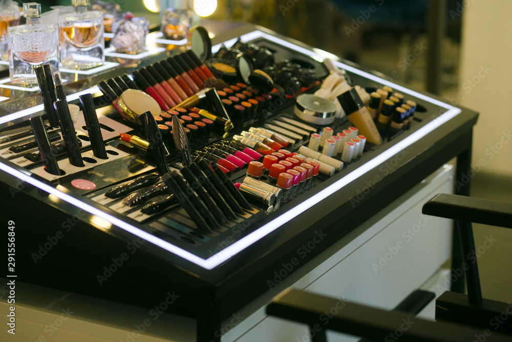 variety cosmetics perfumes stand makeup test probes