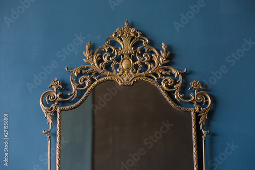 antique mirror gold patterned frame blue background