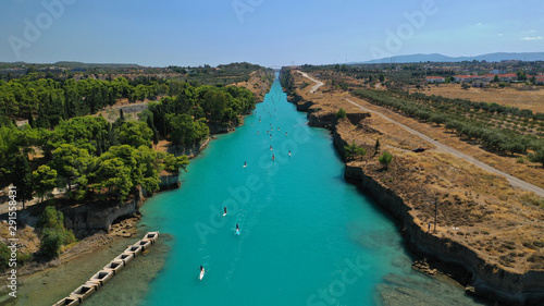 Wallpaper Mural Aerial bird's eye view photo taken by drone of stand up paddle surfers in annual SUP crossing competition in Corinth Canal, Greece Torontodigital.ca