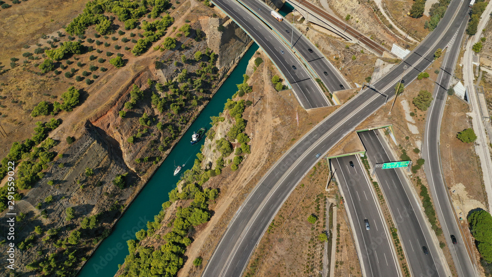 Aerial photo taken by drone of Corinth Canal of Isthmos or Isthmus connecting mainland with Peloponnese, Greece Aerial photo taken by drone of Corinth Canal of Isthmos or Isthmus connecting mainland with Peloponnese, Greece