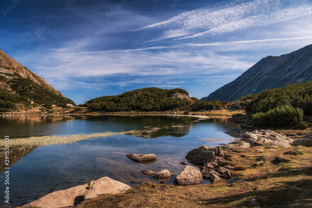 Panoramic morning view of Muratovo lake, Pirin Mountain, Bulgaria Panoramic morning view of Muratovo lake, Pirin Mountain, Bulgaria