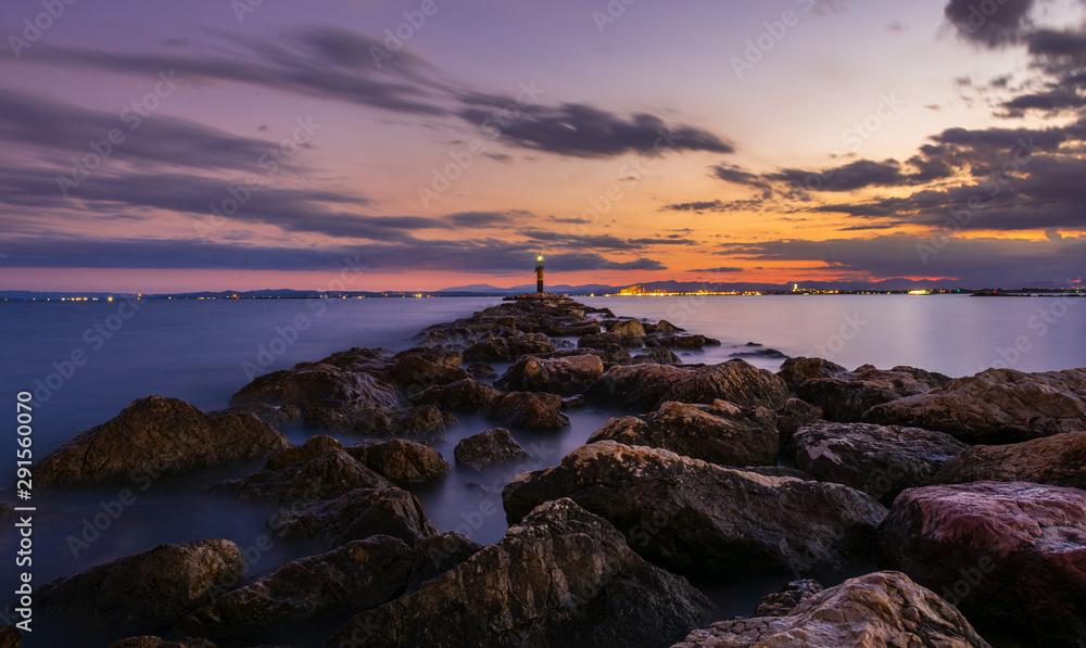 Breakwater rocks on the Gulf of Roses, Spain, at long exposure.