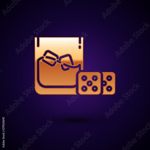 Gold Game dice and glass of whiskey with ice cubes icon isolated on dark blue background. Casino gambling. Vector Illustration
