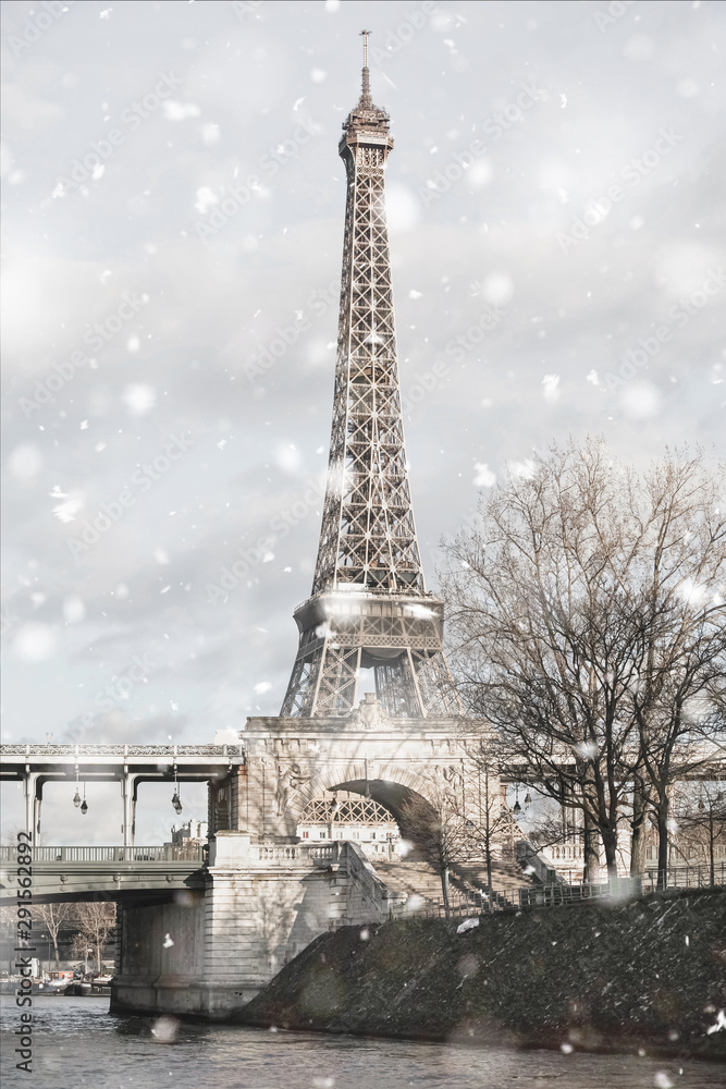 Eiffel Tower in Paris, France in snowstorm