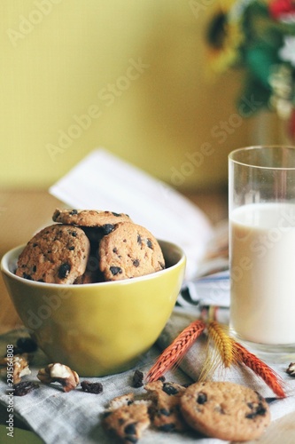 Obraz na płótnie Tasty cookies or biscuits and milk, home comfort w salonie