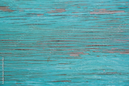 Textured wood with old turquoise paint