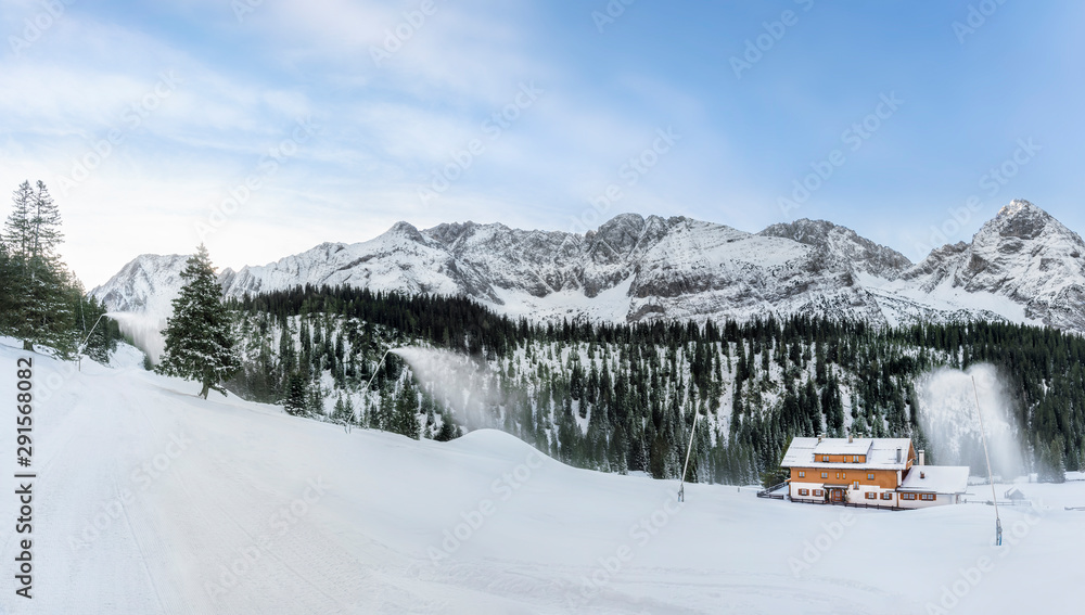 Snowy mountains and road in Austrian Alps Snowy mountains and road in Austrian Alps
