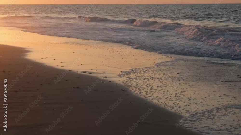 Beautiful sunrise and ocean side scenery at Topsail Beach, a vacation community by the Atlantic ocean in North Carolina, USA Beautiful sunrise and ocean side scenery at Topsail Beach, a vacation community by the Atlantic ocean in North Carolina, USA