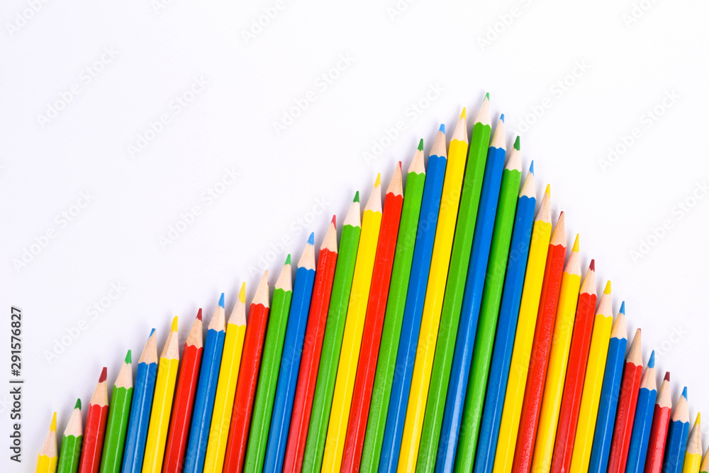 Many different colored pencils on a white background with a place for text and cory space . Many different colored pencils on a white background with a place for text and cory space .