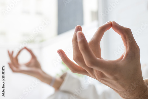 hands closeup with yoga and meditation gesture