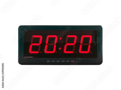 close up red led light illumination numbers 2020 on black digital electric alarm clock face isolated on white background, time symbol concept for celebrating the New Year