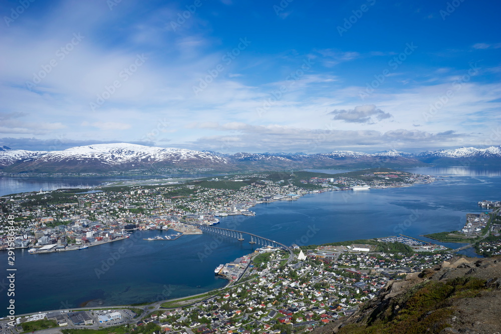 Tromso, Norway with bridge and cruise ship in foreground and airport in background