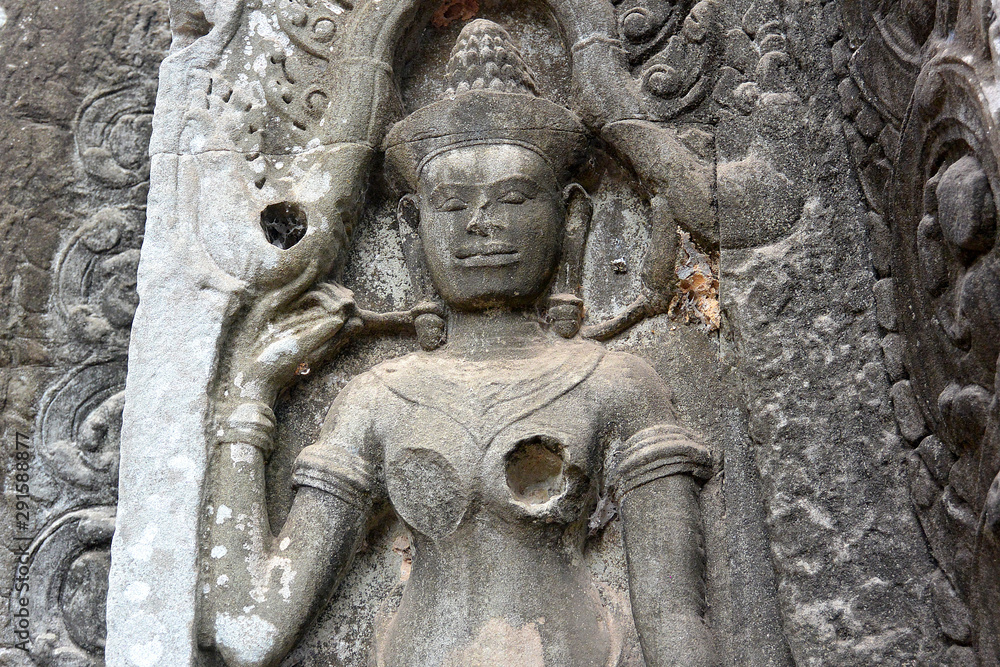 Ancient stone sculpture of the dancer Apsara