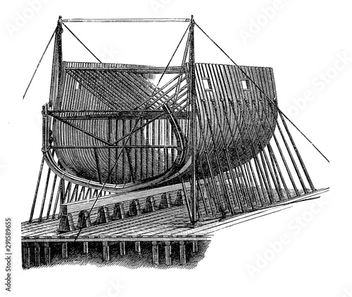 Billede på lærred Naval contruction in the dockyard, casing the ship hull
