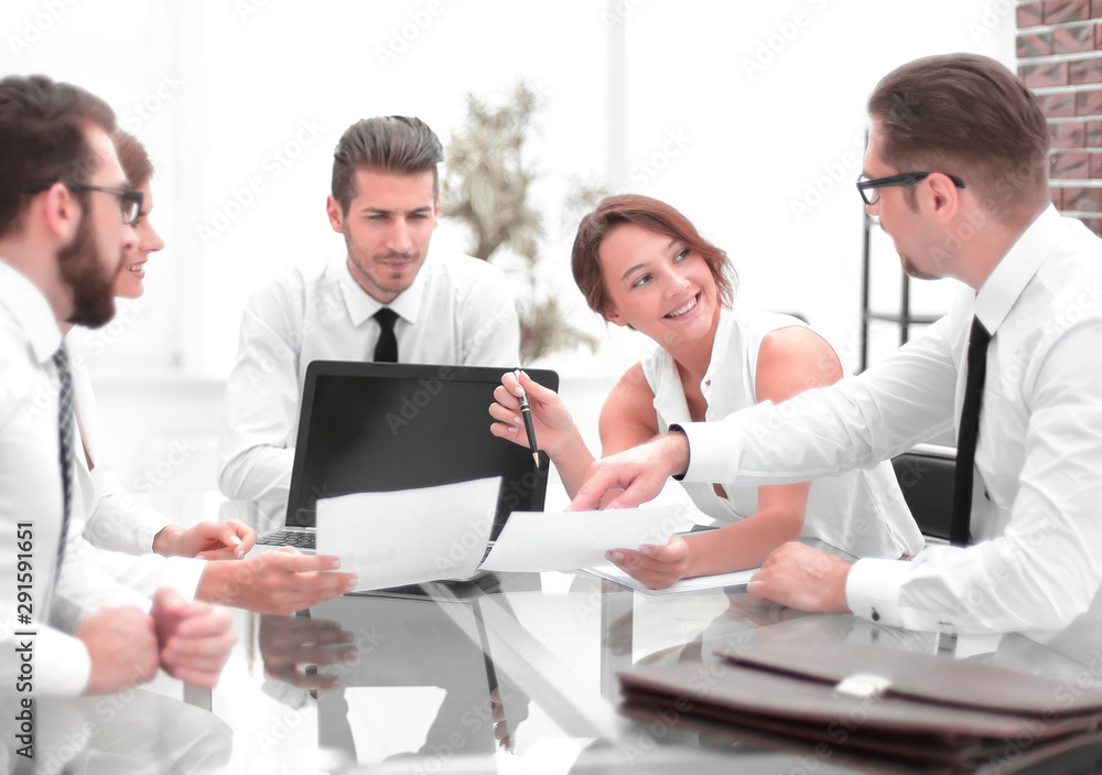 business team discussing financial documents. business team discussing financial documents.