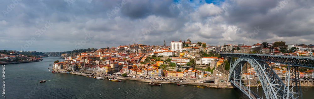 The Beautiful grand panorama view of the old city and Ponte Luis Bridge across the Duoro River in Porto, Potugal.
