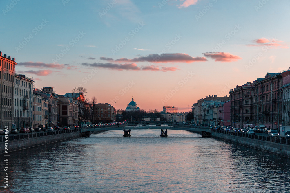 the sunset with views of the Fontanka river and Trinity cathedral, st. Petersburg