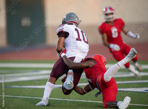 Great action photos of high school football players making amazing plays during a football game