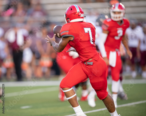 Great action photos of high school football players making amazing plays during a football game