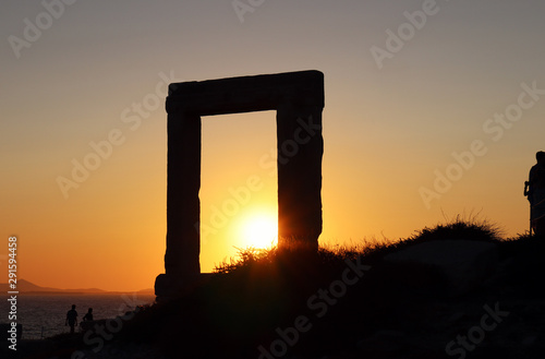 Silhouette of Naxos Portara, Apollo's 6th Cent BC temple ruins, overlooking Naxos town, Greek Islands 