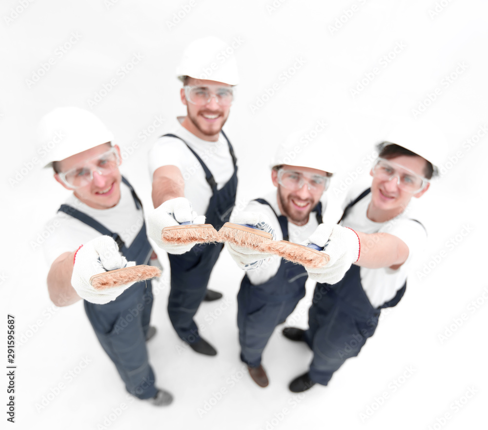 team of construction workers looking at the camera team of construction workers looking at the camera