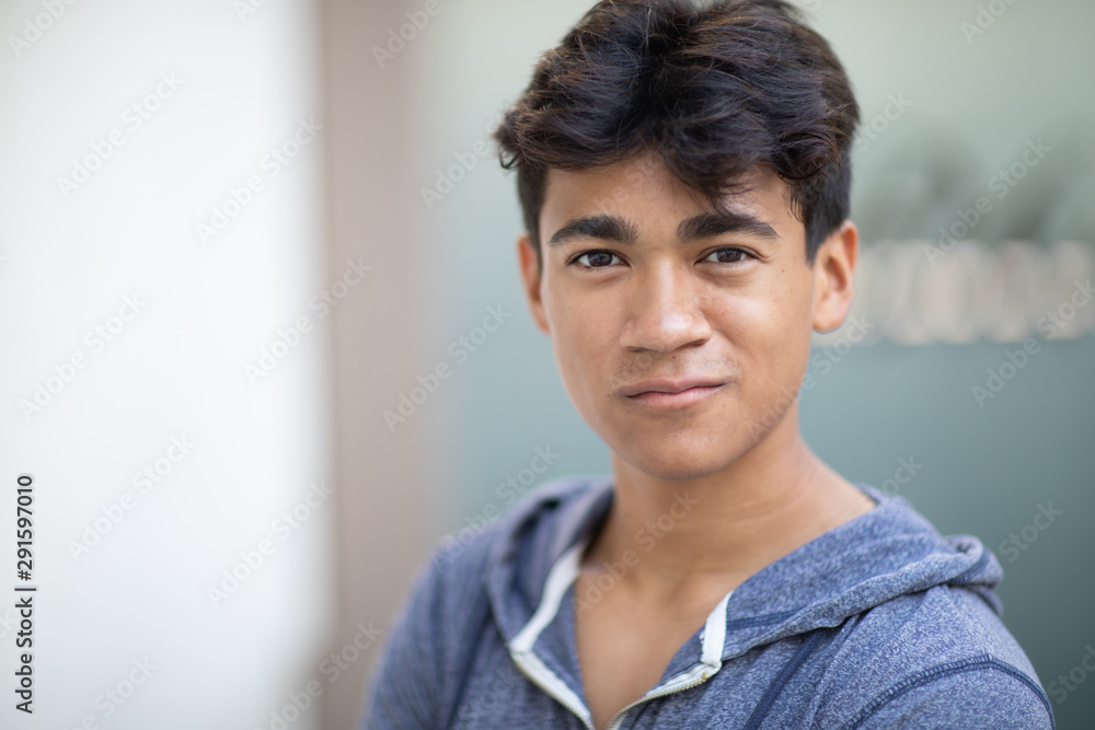 Portrait of a handsome Asian young man next to the blurred background Portrait of a handsome Asian young man next to the blurred background