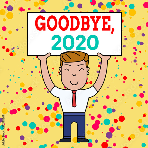 Writing note showing Goodbye 2020. Business concept for New Year Eve Milestone Last Month Celebration Transition Smiling Man Standing Holding Big Empty Placard Overhead with Both Hands photo