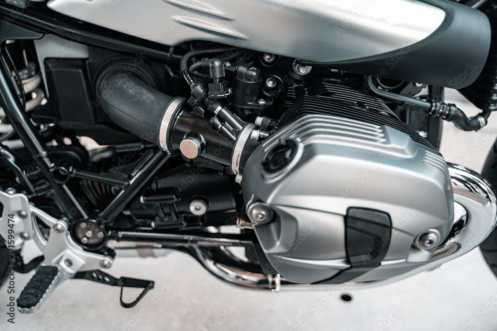 Cropped image of new motorcycle in shop. Cropped image of new motorcycle in shop.